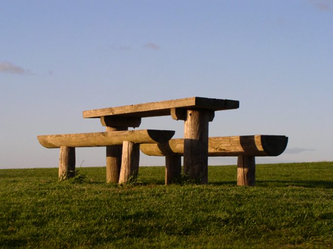 picnic benches at sunset