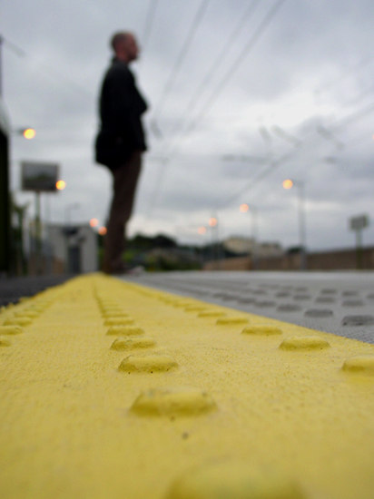 behind the yellow line