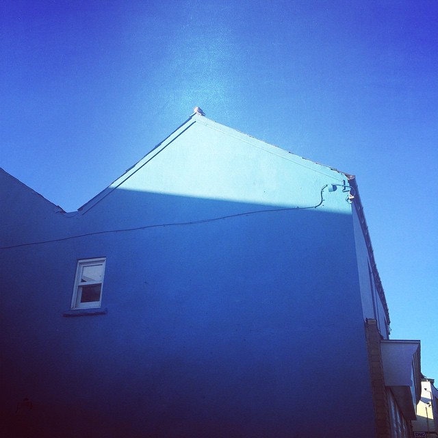 Blue wall, blue sky